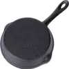 The underside of a black cast iron frying pan is shown against a white background. Produktbild-Vorschau