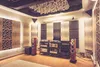 Acoustic treatment panels and audio equipment in a sound studio. Podgląd zdjęcia produktu