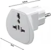 A white travel adapter with multiple plug sockets and a European plug on the side, with dimensions indicated. Produktbild-Vorschau
