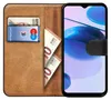 A book-style phone case with cards and cash inserted. Produktbild-Vorschau