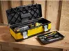 A yellow and black Stanley toolbox is open on a wooden surface, with tools inside and a tray of tools beside it. Anteprima dell’immagine prodotto