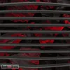 A close-up view of a grill grate over glowing red coals. Produktbild-Vorschau
