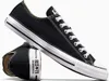 A pair of black Converse All Star sneakers. Voir les images du produit