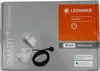 The image shows the packaging of a smart plug for outdoor use. Náhled obrázku produktu