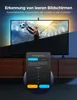 A TV with a soccer player on screen, and a pop-up menu for light settings. Produktbild-Vorschau