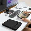 A desk setup with a monitor, laptop, keyboard, tablet, and a laptop sleeve. Produktbild-Vorschau