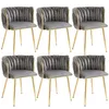 A set of six gray velvet dining chairs with gold metal frames, arranged in two rows of three. Produktbild-Vorschau