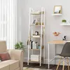 A ladder shelf filled with books and decorative items, placed next to a desk in a room. Náhľad obrázku produktu