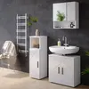A modern bathroom setting with white furniture and a chrome towel rack. Voir les images du produit
