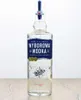 A bottle of Wyborowa Vodka on a wooden surface against a white background. Produktbild-Vorschau