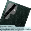 Close-up of a dark green smartphone back with water droplets and a camera module. Produktbild-Vorschau