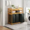 A laundry room with a bamboo shelving unit containing laundry baskets, towels, and decorative items. Anteprima dell’immagine prodotto