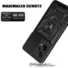 A black phone case with a ring holder and camera protection is shown at an angle, with debris scattered below it. Produktbild-Vorschau