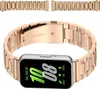A rose gold metal watch strap is shown attached to a smartwatch. Produktbild-Vorschau