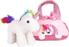 A plush unicorn toy is placed next to a pink handbag with a unicorn design. Produktbild-Vorschau
