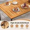 A close-up of a wooden table with breakfast items and marketing text about the wood quality. Produktbild-Vorschau