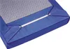 A close-up view of a blue mattress protector with a patterned top and a white zipper closure. Produktbild-Vorschau