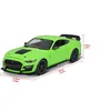A green toy car with dimensions indicated by measurement lines and text. Podgląd zdjęcia produktu