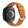 The back of a smartwatch with a brown leather strap is shown against a white background. Náhled obrázku produktu