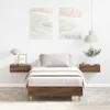 A bedroom scene with a single bed, nightstands, and artwork on the wall. Produktbild-Vorschau
