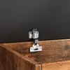 A close-up of a metal hinge and latch on a wooden surface. Náhled obrázku produktu