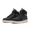 A pair of black Nike high-top sneakers with beige soles and accents, shown against a white background. Náhľad obrázku produktu