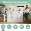 A man and a woman are sitting at a kitchen island in a modern kitchen. Náhled obrázku produktu