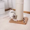 A cat is playing with a scratching post on a rug. Produktbild-Vorschau