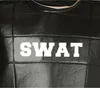 A close-up view of a black vest with the word "SWAT" printed in white on the front. Produktbild-Vorschau
