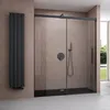 A modern bathroom with a black framed shower enclosure and a black radiator. Produktbild-Vorschau