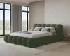 A modern bedroom with a green upholstered bed, large windows, and soft lighting. Voir les images du produit