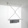 A ceiling-mounted clothes drying rack with towels hanging from it. Podgląd zdjęcia produktu