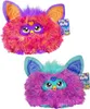 Two Furby toys are shown against a white background. One is in the upper half of the image, and the other is in the lower half. Voir les images du produit