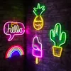 Various neon signs are displayed on a brick wall. Podgląd zdjęcia produktu