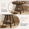 Collage of two images showing a round, two-tier industrial-style table with a wooden top and black metal legs, highlighting its design and storage space. Produktbild-Vorschau