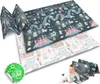 A baby is crawling on a play mat with a fairytale design. The mat is folded in the foreground and unfolded in the background, showing two different sides. Podgląd zdjęcia produktu