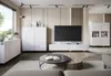 A modern living room with a TV and entertainment unit. Podgląd zdjęcia produktu