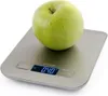 A green apple is placed on a digital kitchen scale. Náhled obrázku produktu