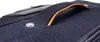 Close-up of a suitcase handle and fabric. Náhled obrázku produktu