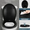 A black toilet seat is shown on a white toilet, with additional panels on the right showcasing features like its shape, ease of cleaning, and weight capacity. Produktbild-Vorschau