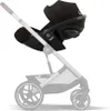 A black baby car seat attached to a stroller frame, shown against a white background. Podgląd zdjęcia produktu