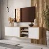 A modern living room with a wall-mounted TV cabinet and a large television. Produktbild-Vorschau