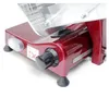 Close-up of a red meat slicer, focusing on the control knob and power switch. Produktbild-Vorschau