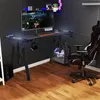 A gaming desk setup with a computer, chair, and accessories in a room. Produktbild-Vorschau