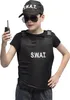 A child wearing a SWAT costume, including a vest, cap, and sunglasses, and holding a toy walkie-talkie. Produktbild-Vorschau