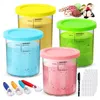 Four colorful ice cream containers with lids, along with ice cream scoops and a marker, are displayed on a white background. Ice cream scoops are shown in the background. Produktbild-Vorschau