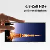 A hand is holding a smartphone horizontally, displaying a picture of a tower at night. Náhľad obrázku produktu