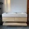 A double sink vanity with drawers and a shelf, mounted on a wall. Anteprima dell’immagine prodotto