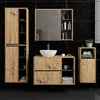 A modern bathroom vanity set with a sink and mirror against a black marble tiled wall. Podgląd zdjęcia produktu