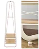 Collage of images showing a white metal garment rack with two wooden shelves, highlighting its structure and details. Voir les images du produit